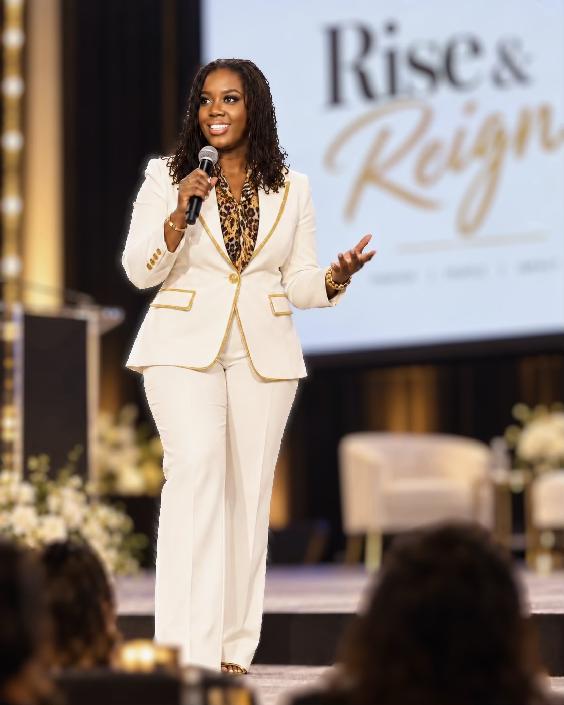 Freedom I Reign founder speaking at a women's conference