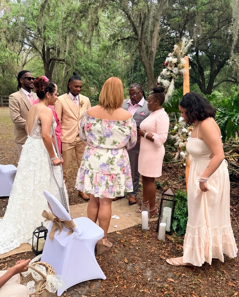 Wedding ceremony moment with the bridal party